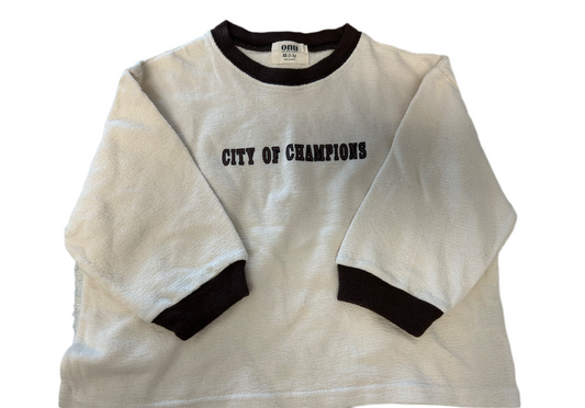 Champions Tee